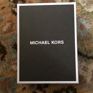 Michael Kors black leather business card holder.
